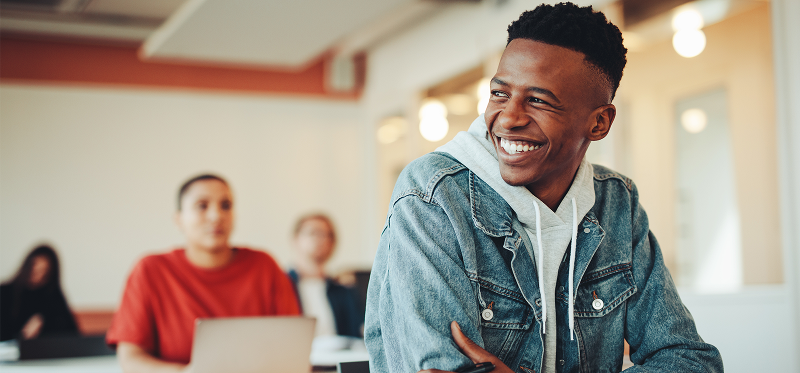 student smiling in class