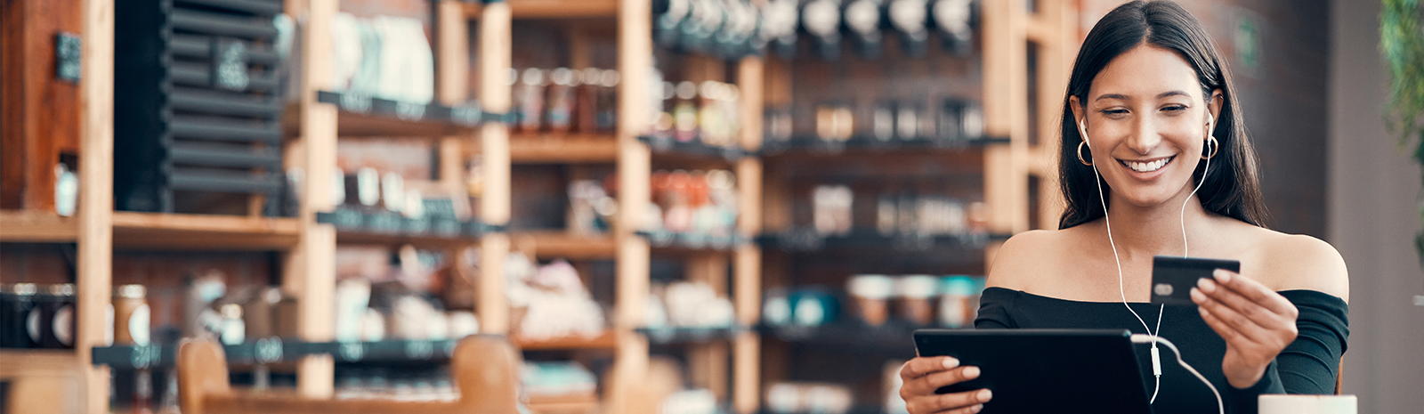 Girl using credit card for online purchase